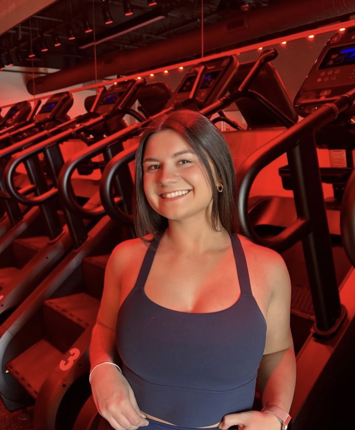 Brianna Parsons smiling in a fitness studio